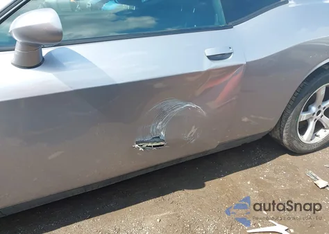 2013 Dodge Challenger Sxt z USA, uszkodzony, nr VIN 2C3CDYAG7DH675121